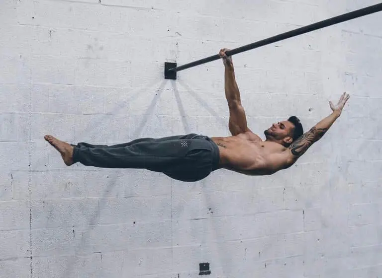 Osvaldo Lugones en Front Lever à un bras - Nomadslim Movement Academy